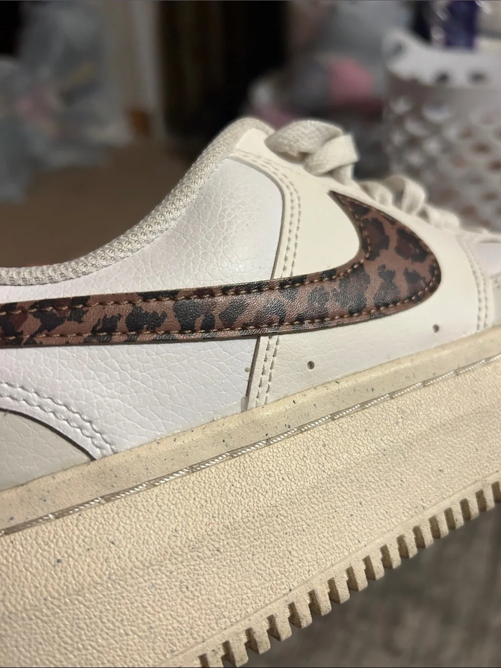 Nike White Low-Top Sneaker with Brown Leopard Swoosh